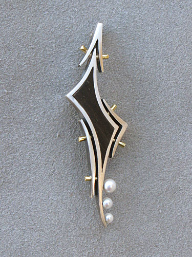 Brooch, silver and gold with ebony and pearls